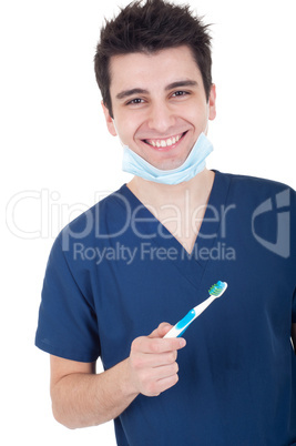 Dentist with toothbrush