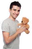 Man holding teddy bear
