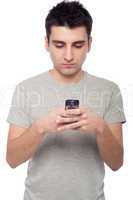 Casual man text messaging