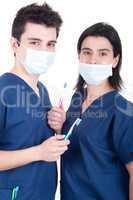 Doctors team with toothbrush