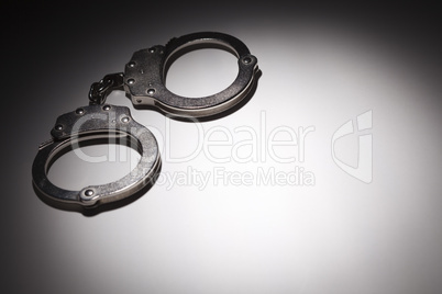 Abstract Pair of Handcuffs Under Spot Light - Text Room