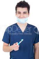 Dentist with toothbrush