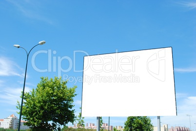 Blank billboard on a urban street