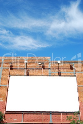 Blank billboard on a brick building