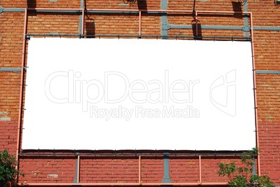 Blank billboard on a brick building