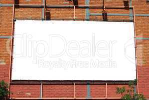 Blank billboard on a brick building