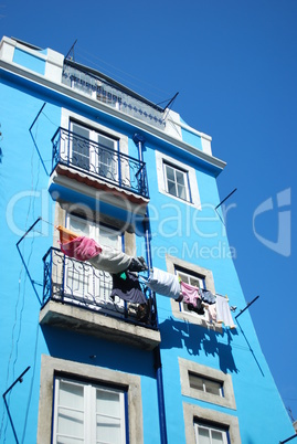 Clothes drying at the window on Lisbon's downtown