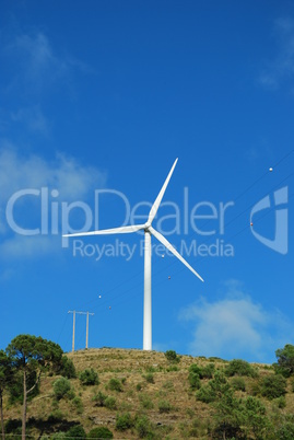 Wind turbine on the top of a mountain