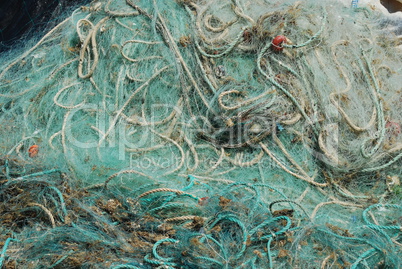 Old fishing nets in the port of Cascais, Portugal