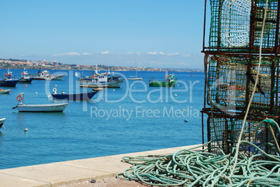 Old fishing equipment in the port of Cascais, Portugal