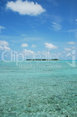 Maldives Island with gorgeous water/cloudscape