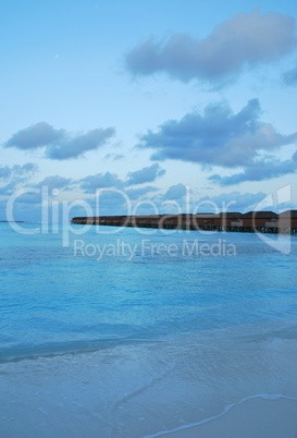 Seascape and water villas in Maldives (sunset)