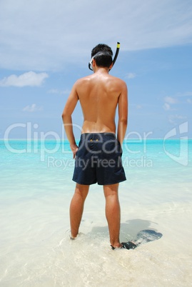 Young man ready to go snorkeling