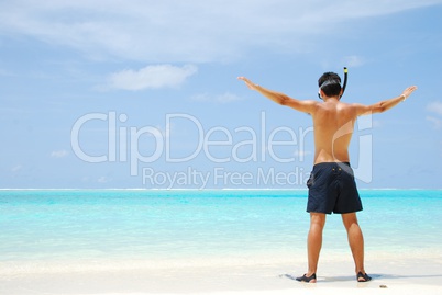 Young man ready to go snorkeling (wide open arms)