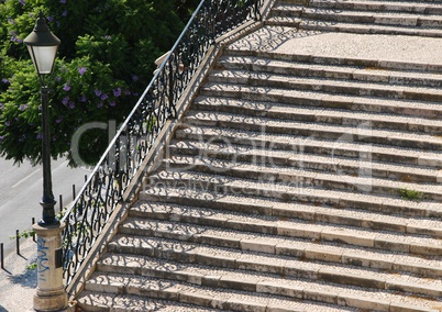 Vintage stairway with traditional lamp post