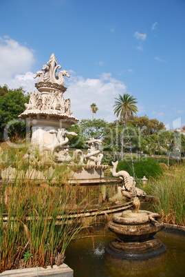 Antique fountain in Ajuda Garden in Lisbon, Portugal