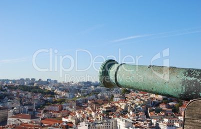 Cityscape of Lisbon in Portugal with cannon weapon