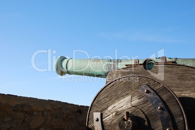 Antique cannon weapon (sky background)