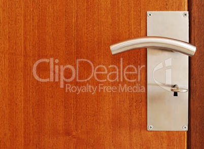 Metallic door handle with key