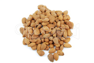 Scattered pile of almond nuts