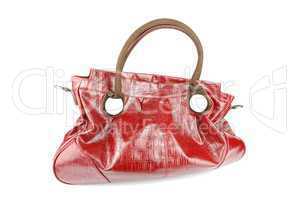 Red woman leather bag on white