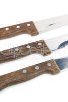 Close-up of wooden kitchen knifes on white