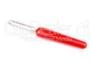 Red peeler on white