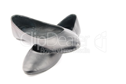 Lady black leather ballet flat shoes on white