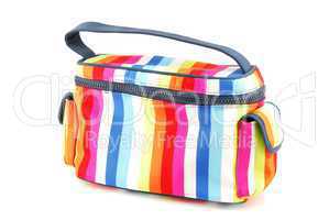 Colorful toiletry bag on white