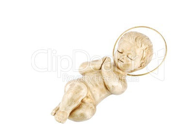 Golden baby Jesus lying on white