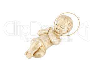 Golden baby Jesus lying on white