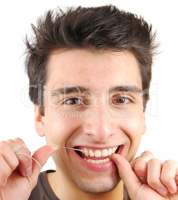 Man flossing his teeth