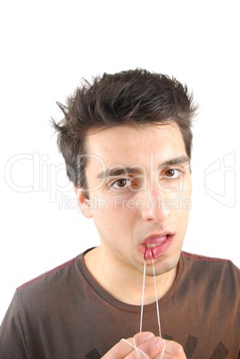 Man flossing his teeth (don't want expression)