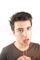 Man flossing his teeth (don't want expression)