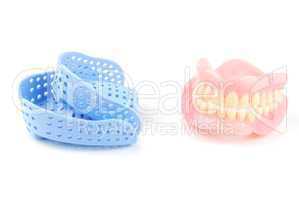 Denture and trays