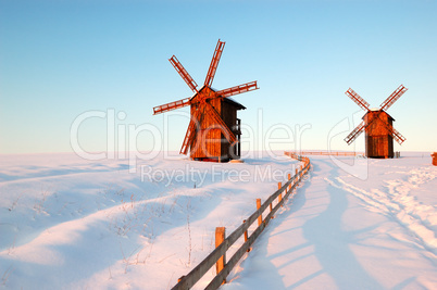 The old wooden windmills during sunset, Cherkasi region, Vodyani