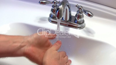 Man washes hands; 2
