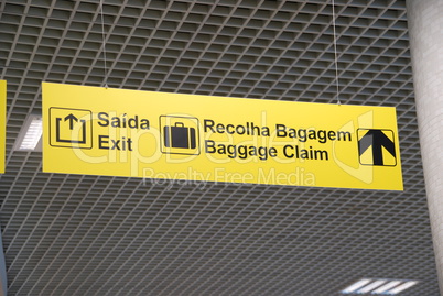 Exit and baggage claim sign