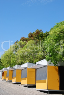 Yellow kiosks at the park