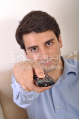 Smiling man watching tv