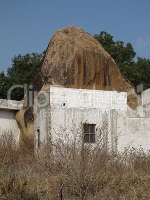 House and granite boulder in Hampi, India