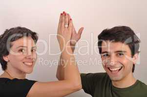Sister and brother high five