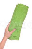 Hand holding beach towel