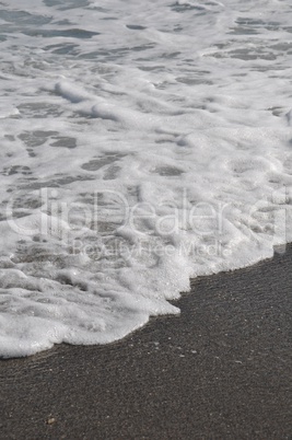 Foam on sand