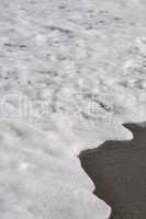 Foam on sand