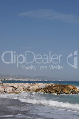 Puerto Banus beach and stone pier