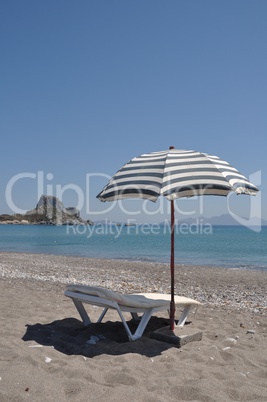 Beach umbrella and chair