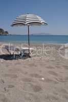 Beach umbrella and chair