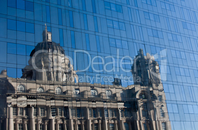 Port of Liverpool building reflected in all glass building