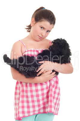 Girl holding dog